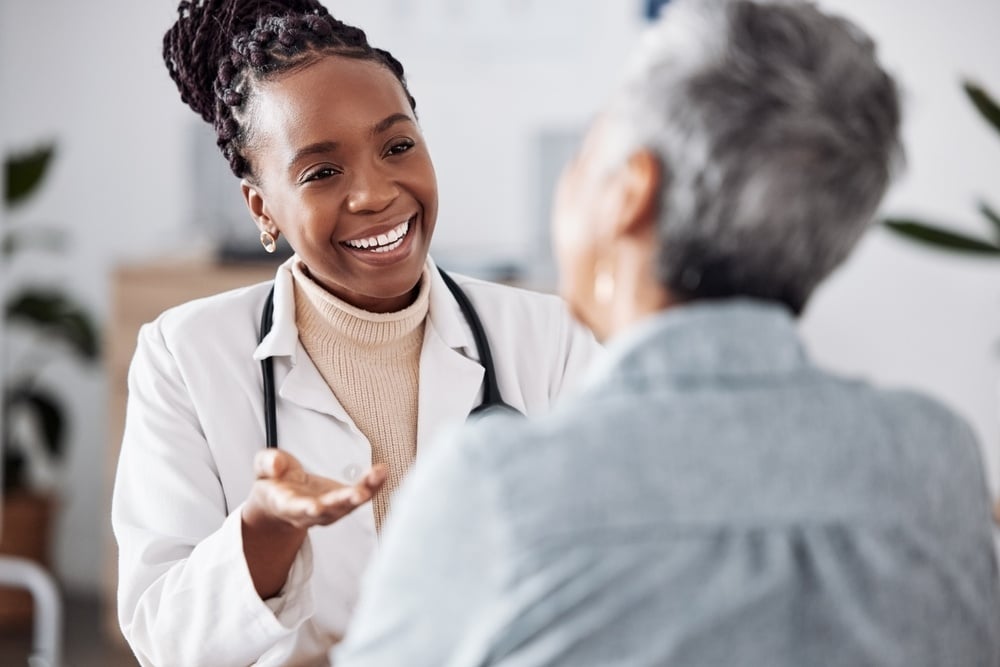womandoctor-with-patient-shutterstock_2352466099